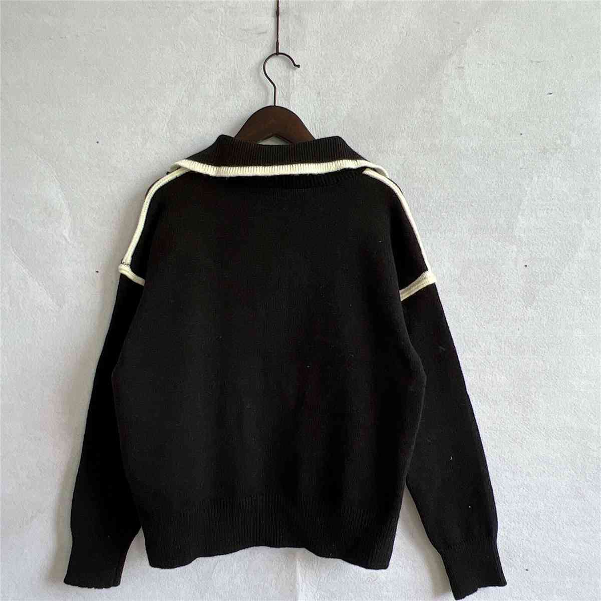 Exposed Seam Half Zip Sweater